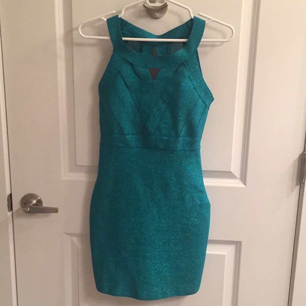 Form fitting stretchy teal dress